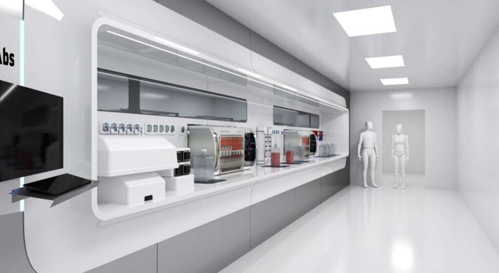 Modern lab workstation in white and grey with various boxy machines on the benchtop